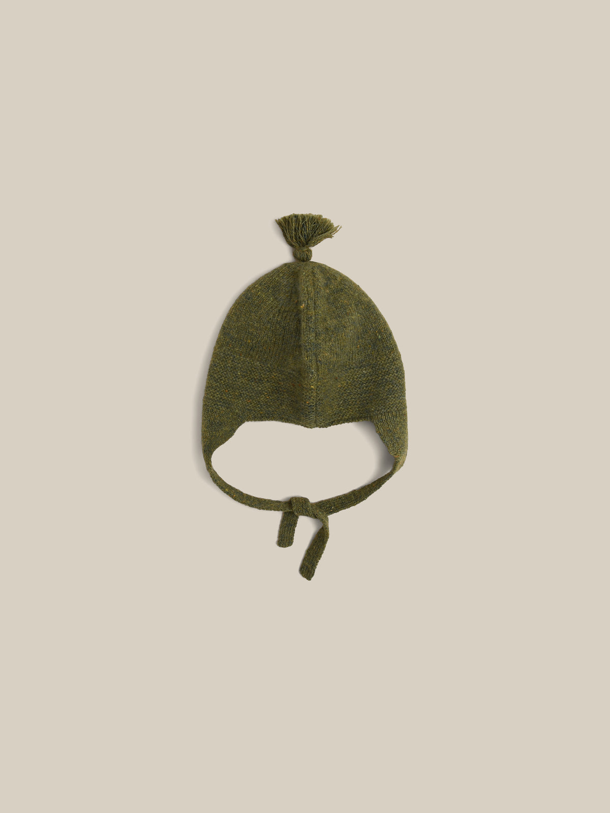 baby and toddler wool hat in dark green with tassel and chin tie