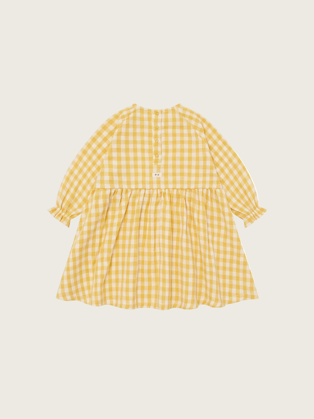 Yellow checkered dress on a white background