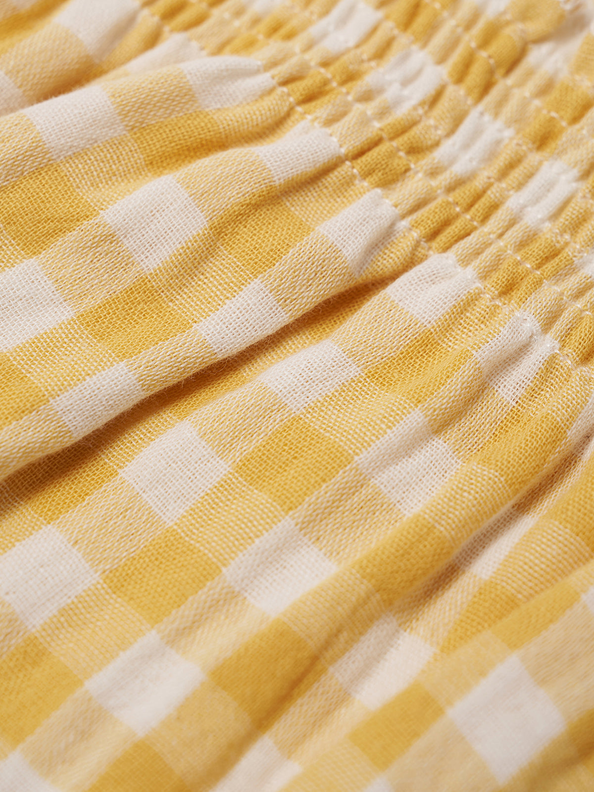 Close-up of yellow and white checkered fabric