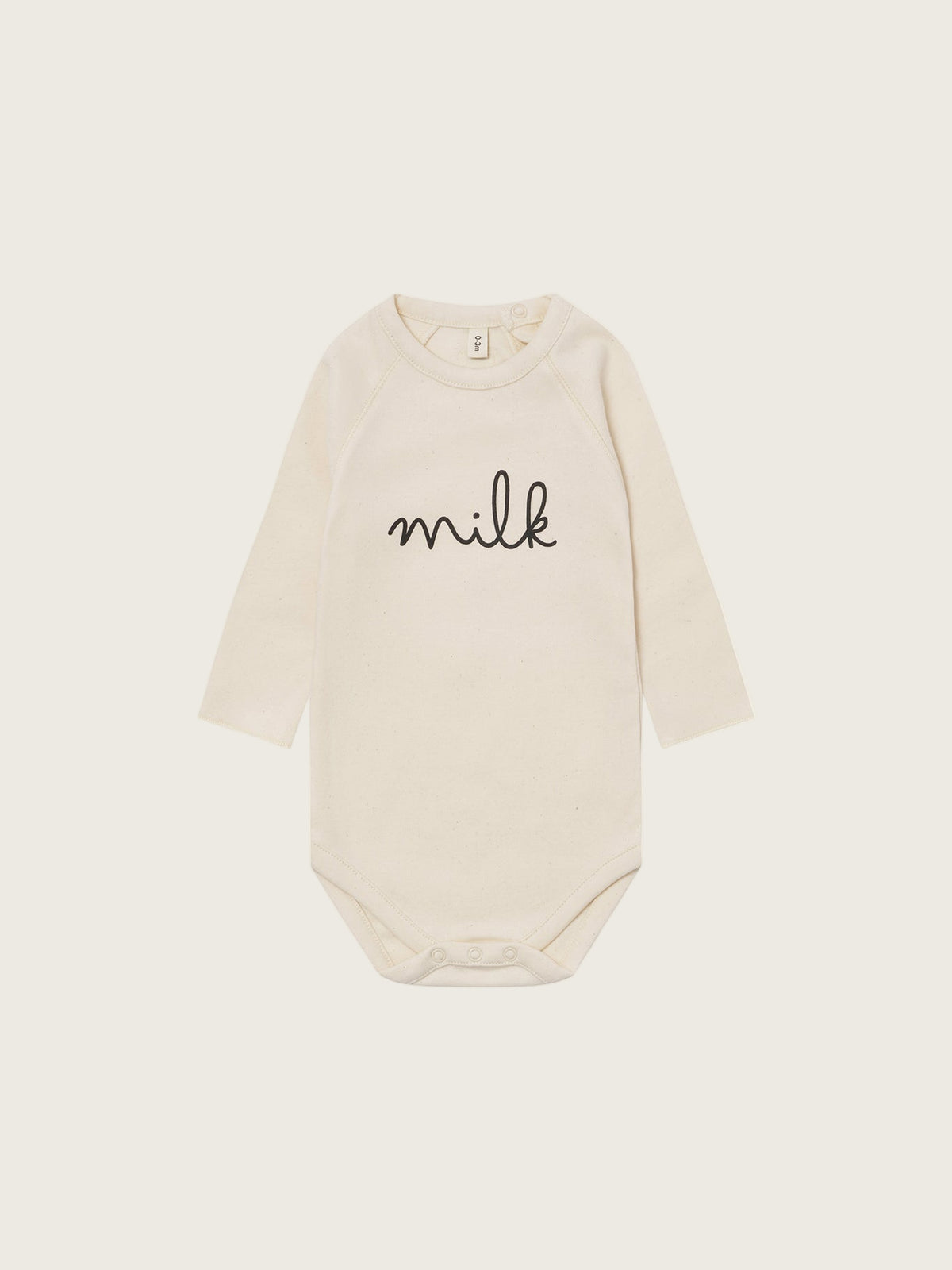 baby cream undyed cotton bodysuit with milk text, crotch poppers and back print