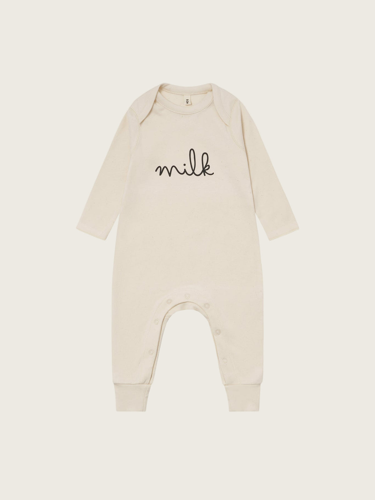 baby cream undyed cotton playsuit with milk text, crotch poppers, ribbed ankle cuffs, and back print