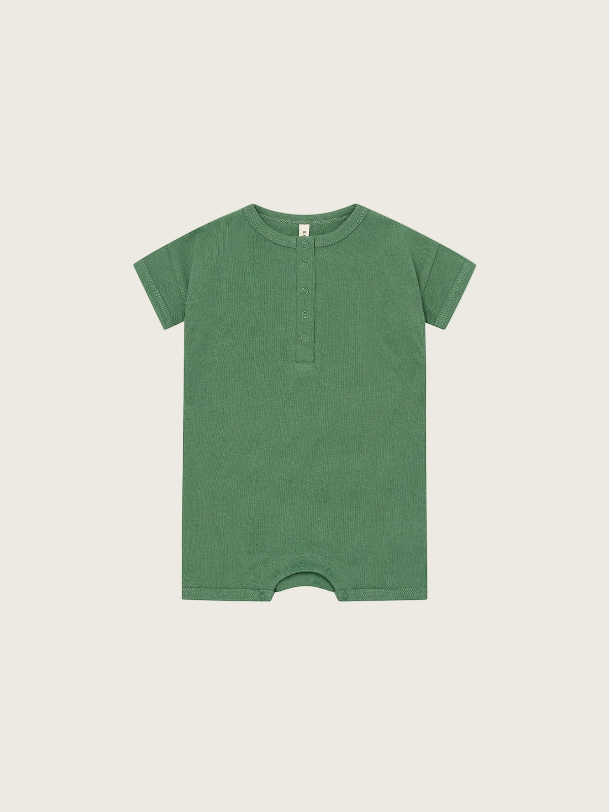 Green baby romper on a white background