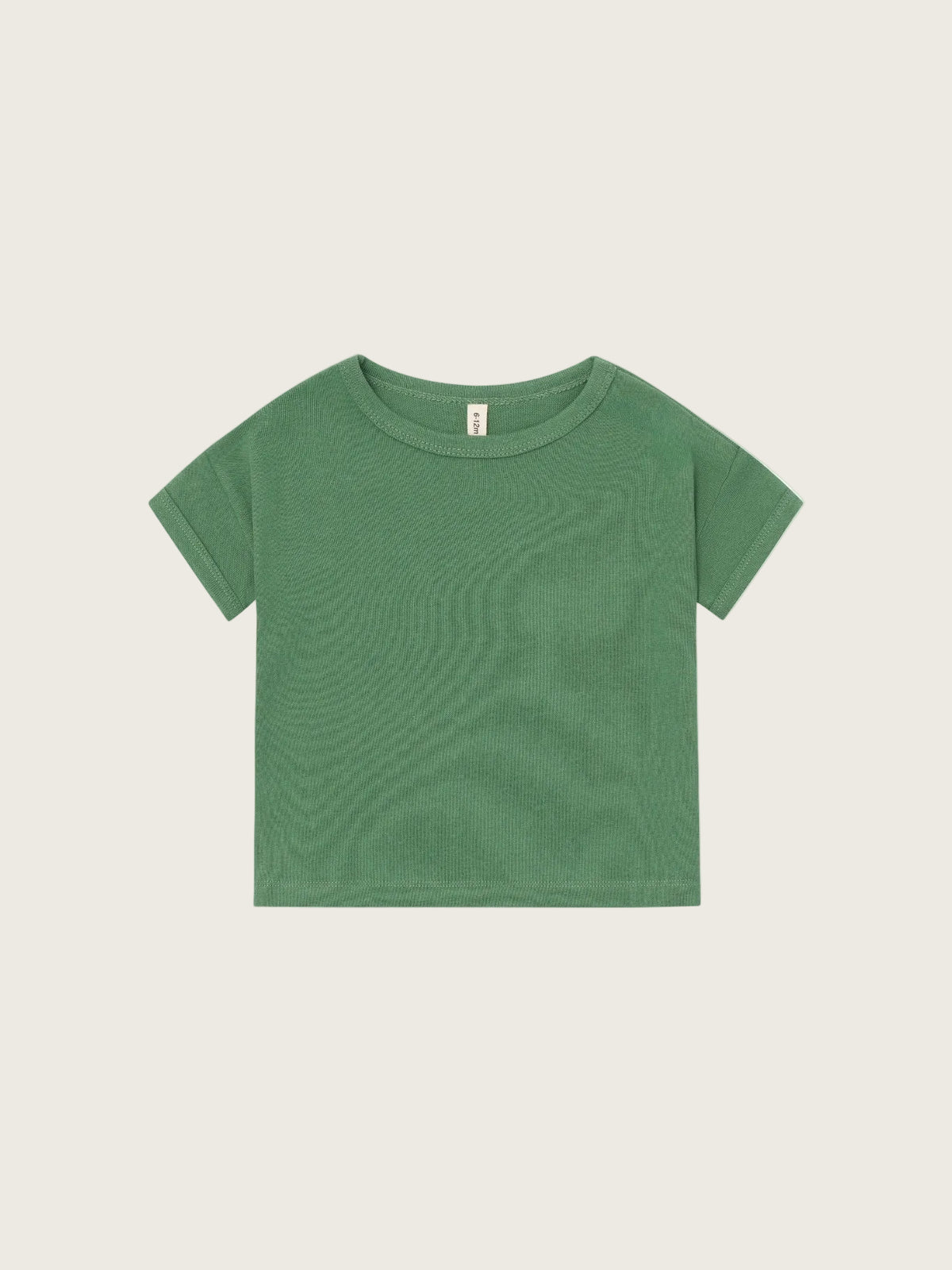 Green t-shirt on a light gray background