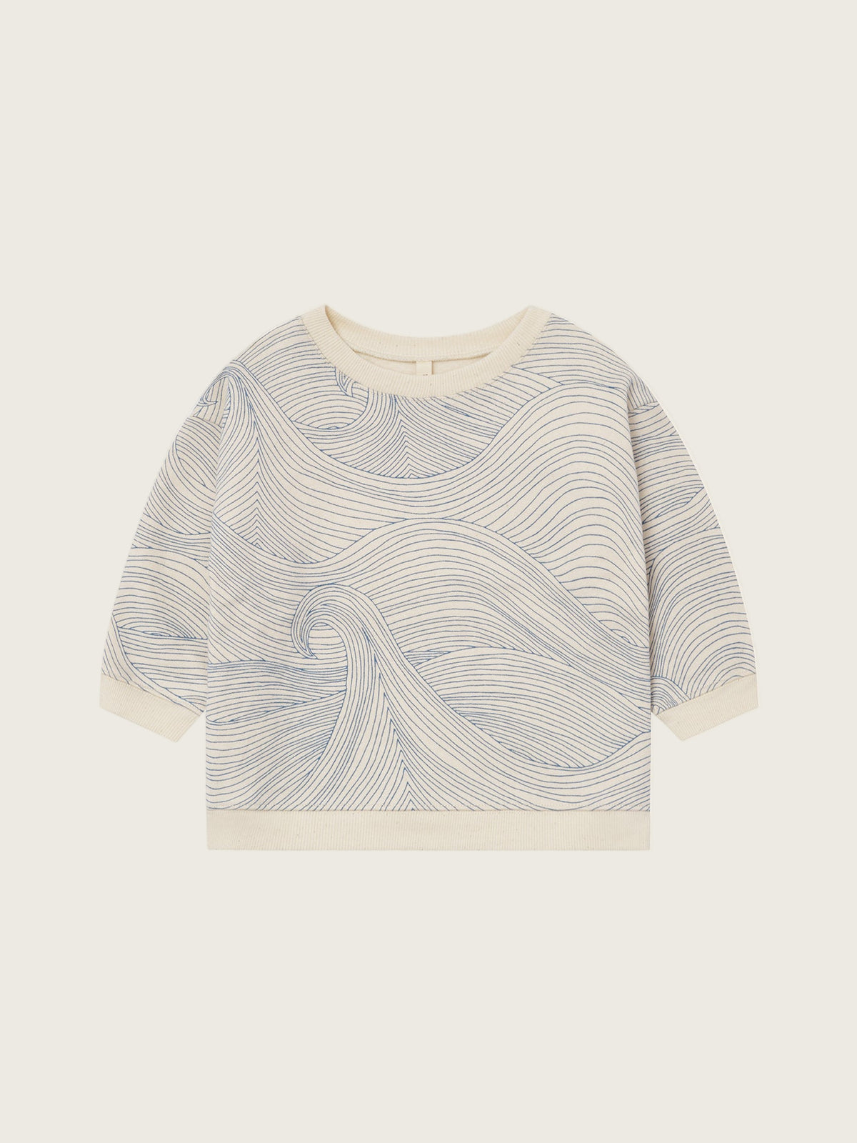 toddler cream undyed cotton sweatshirt with Seascape design of flowing blue line-drawn ocean waves