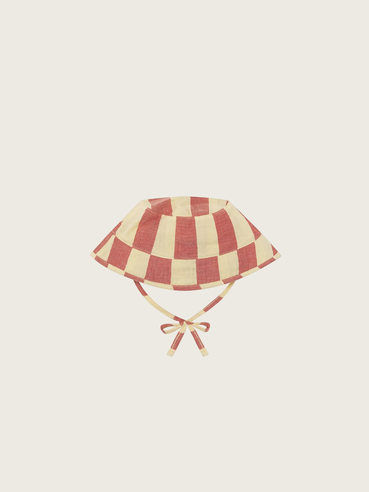 Red and beige checkered sun hat with a bow on a white background