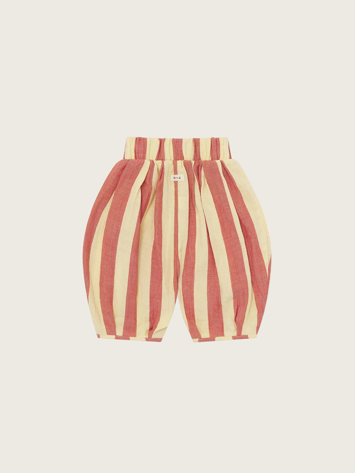 Red and beige striped baby pants on a white background