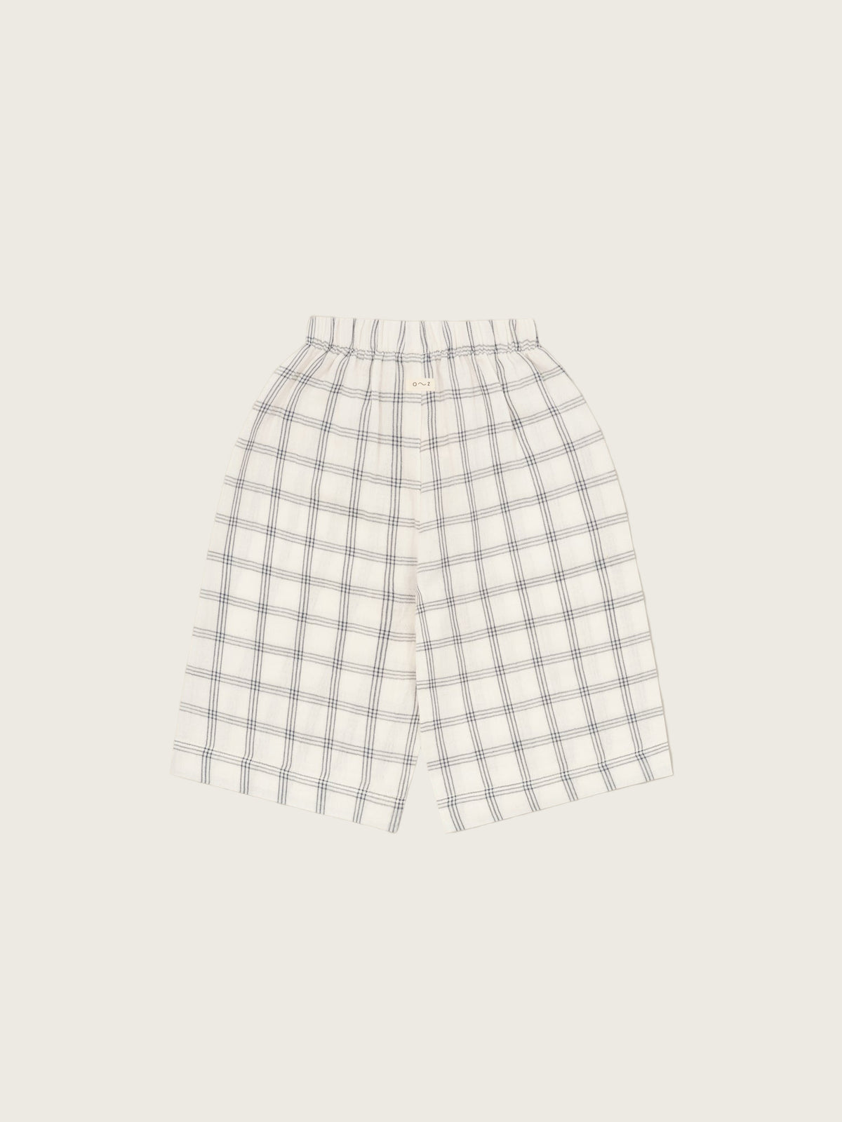 toddler wide leg organic muslin trousers in white with navy window check print & elastic waistband