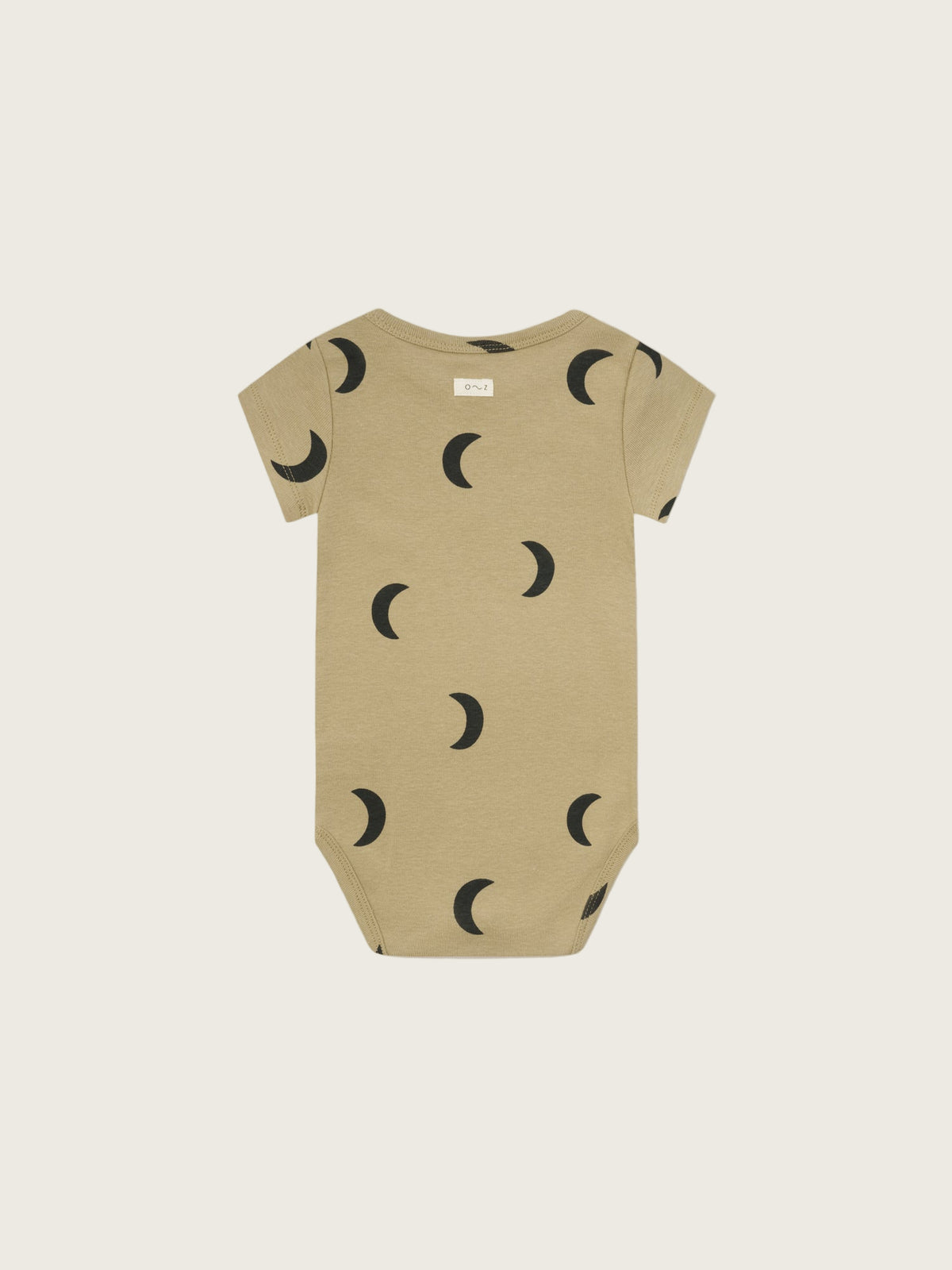 baby dusky beige organic ribbed cotton short sleeved bodysuit with black moons, shoulder & crotch poppers