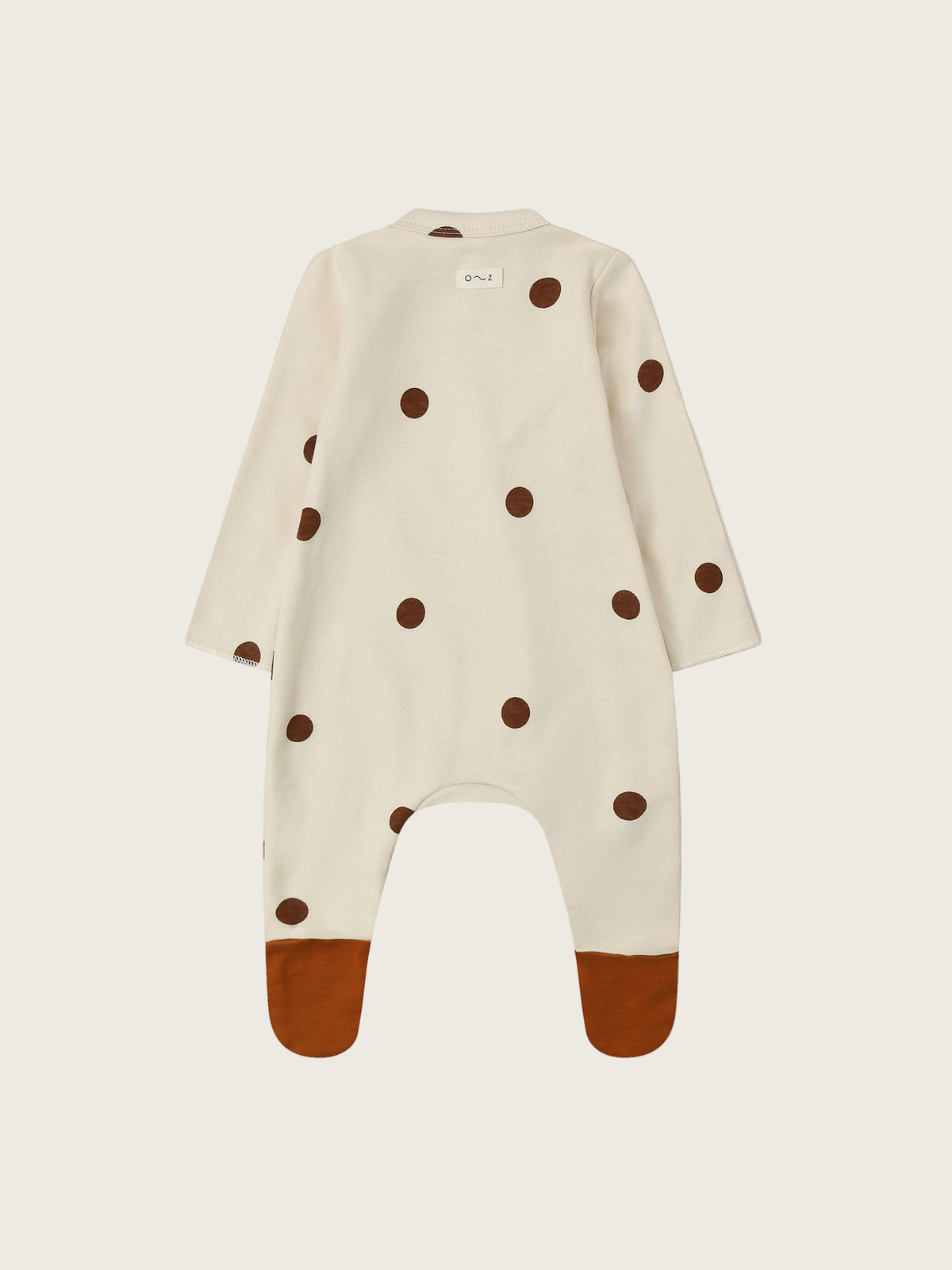 baby & toddler footed suit in cream with through front poppers brown dots & feet