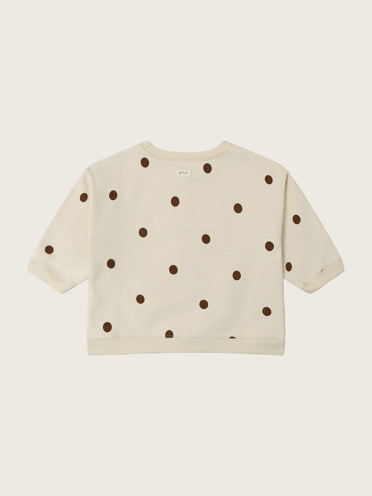 baby and toddler undyed cotton sweatshirt in cream with brown dots