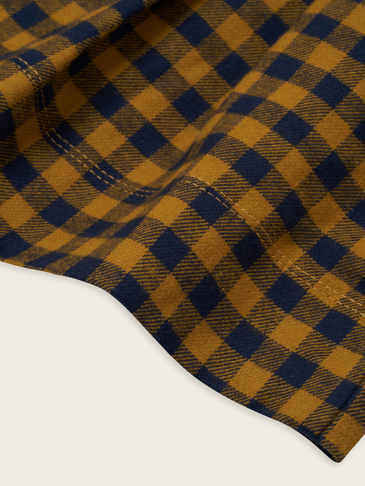 Close-up of brown and navy checkered fabric