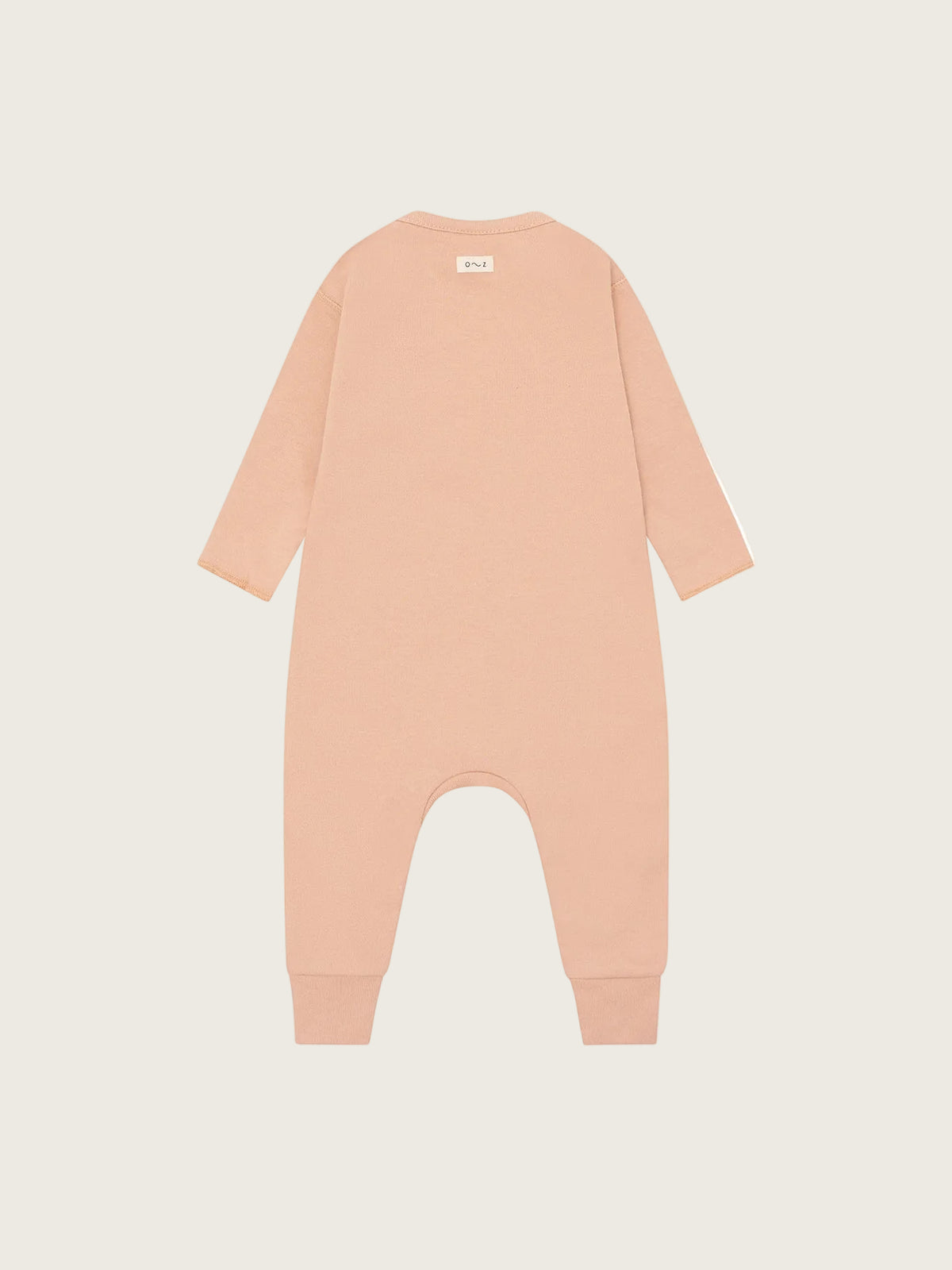 Beige baby onesie on a white background