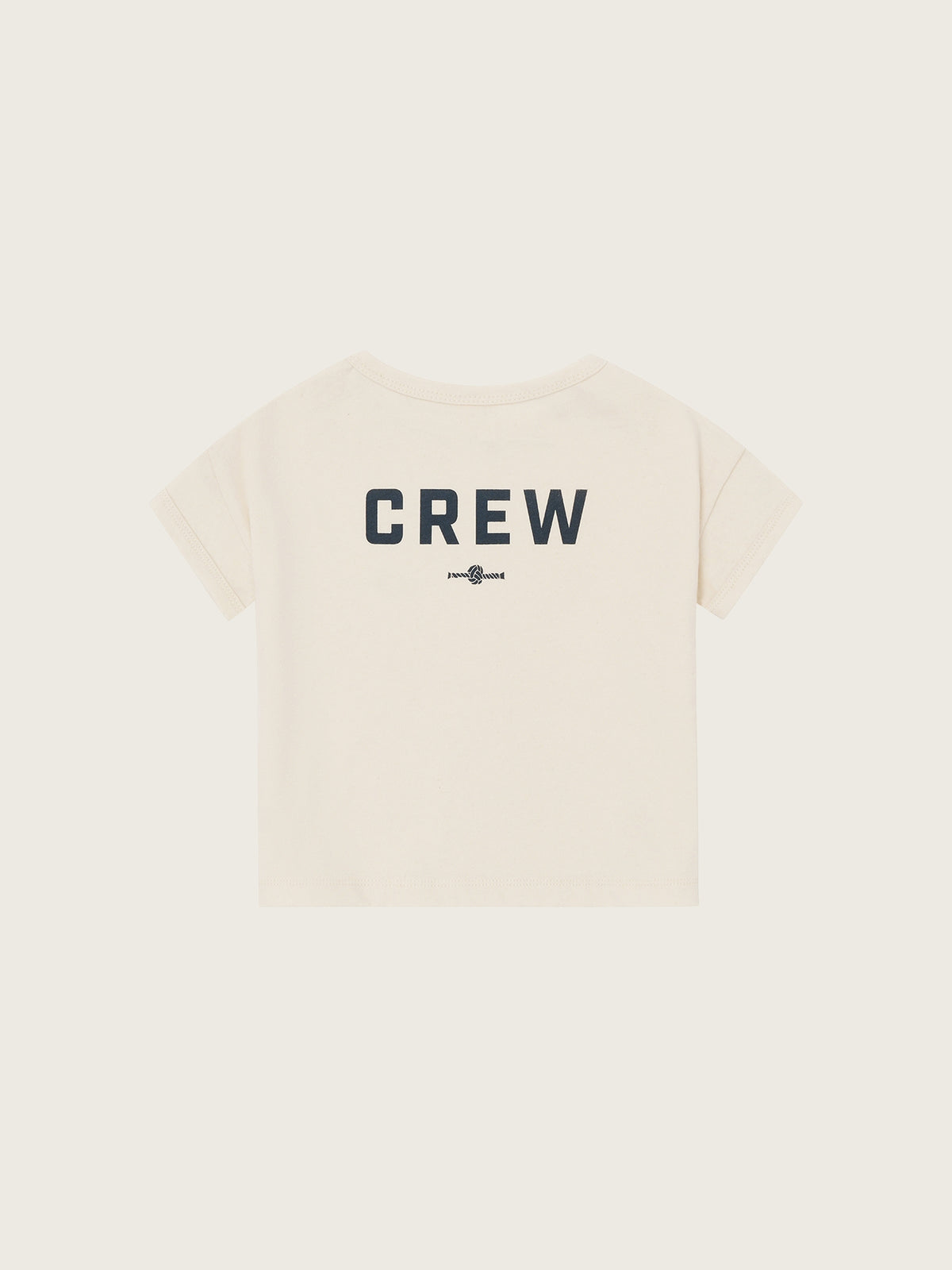 Beige t-shirt with 'CREW' text on a white background