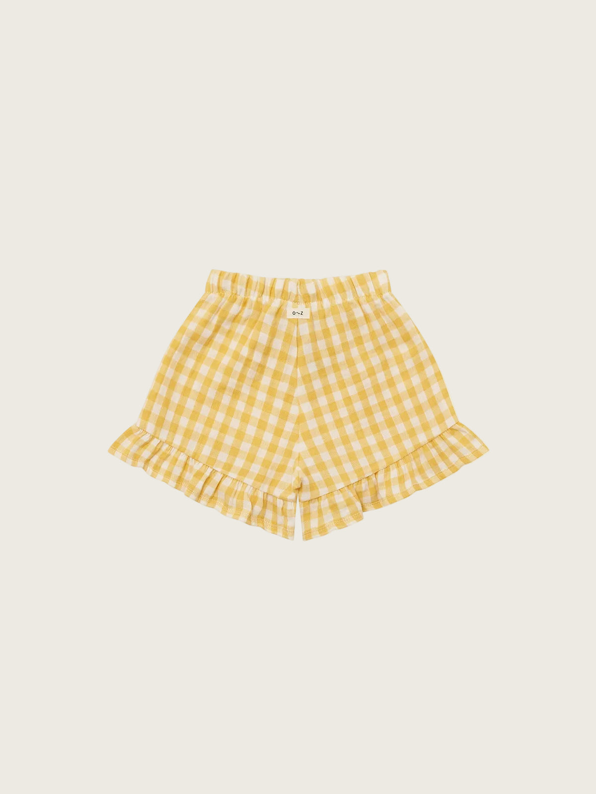 Yellow checkered shorts on a white background