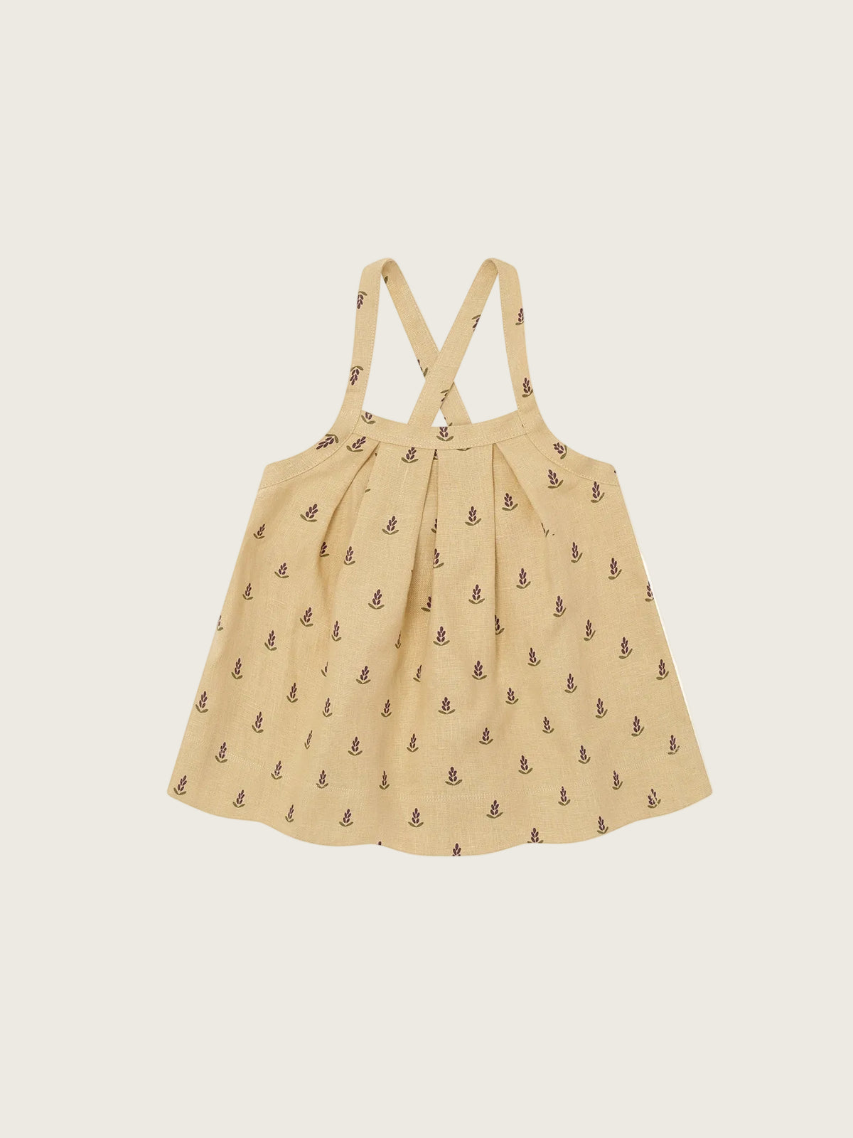 Beige dress with a subtle pattern on a white background