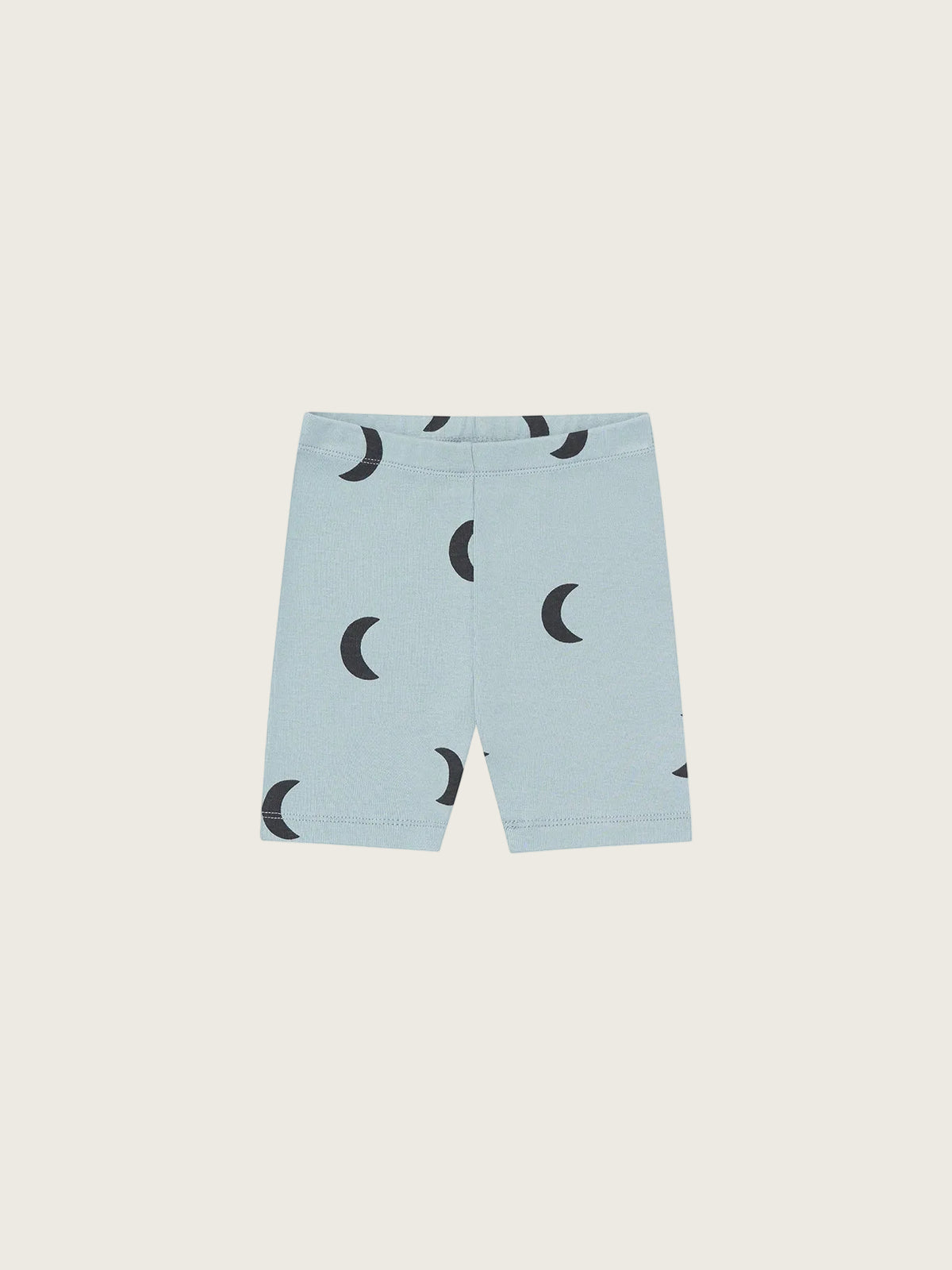 Light blue shorts with black moon pattern on a white background
