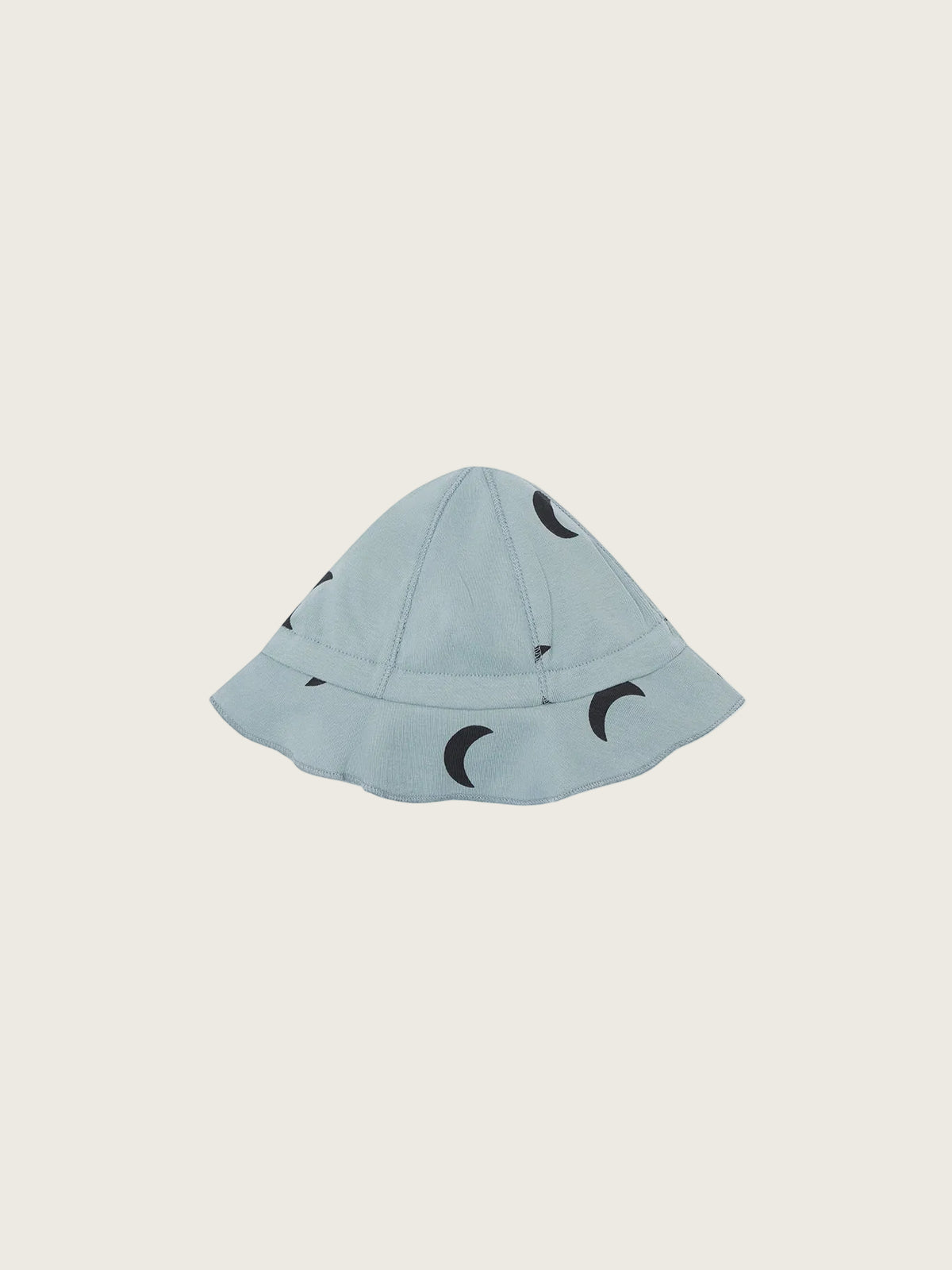 Light blue bucket hat with black crescent moon patterns on a white background