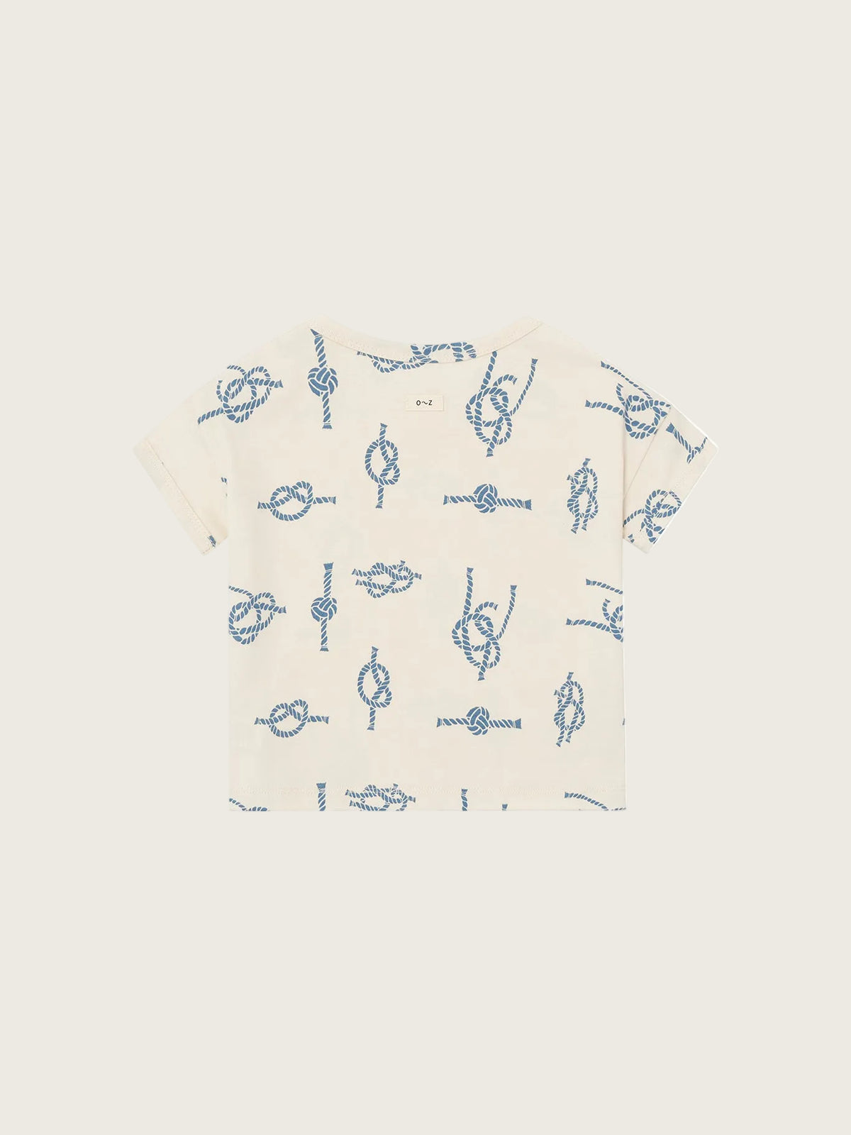 Beige t-shirt with blue knot pattern on a white background