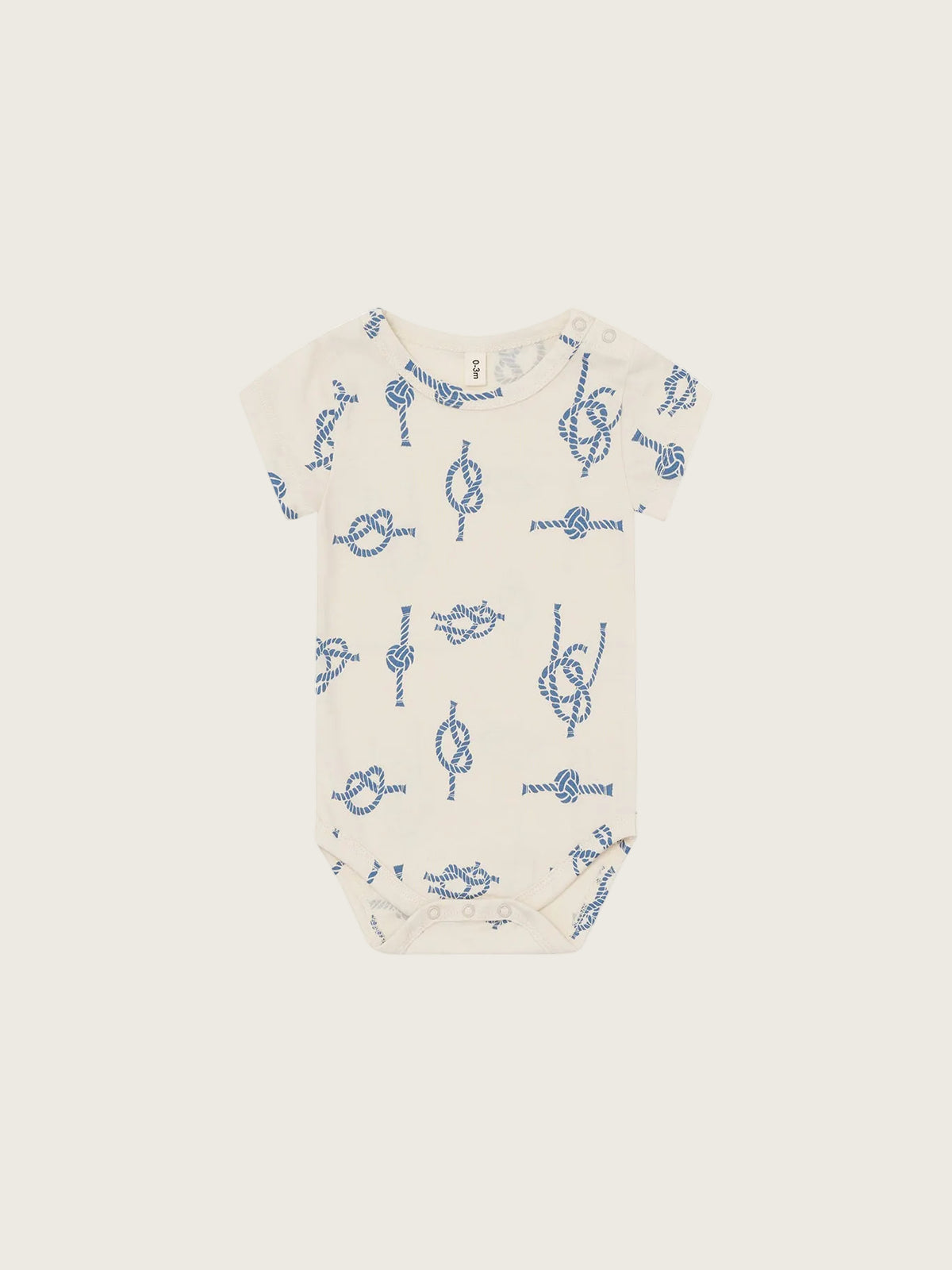Baby onesie with blue knot pattern on a white background