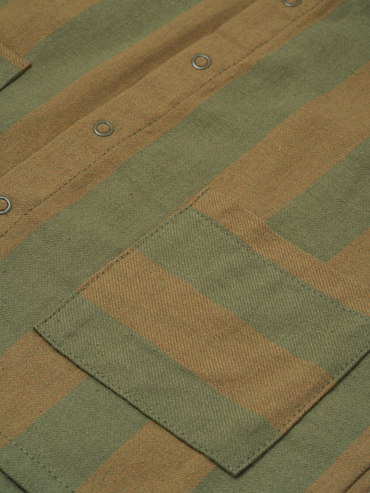 close up of stripes lodge shirt in cream & green with peter pan collar, patch pockets & balloon sleeves