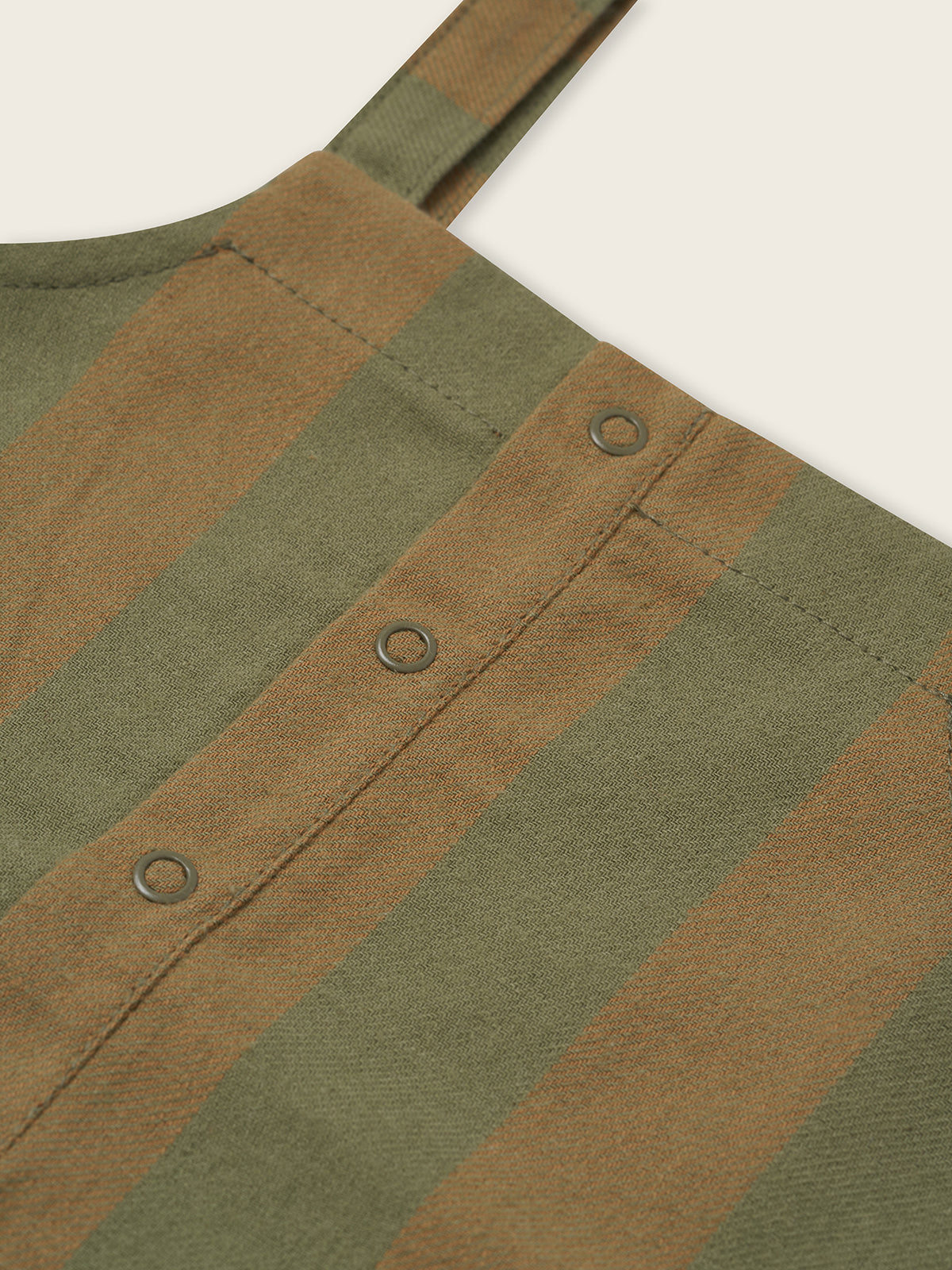 close up of woodland green and cream gingham flannel salopette with front and crotch poppers